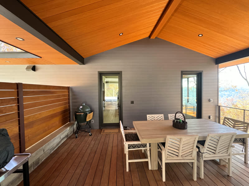 New-build modern mountain home with cedar screens and cable-railed deck overlooking a Cumberland Plateau valley