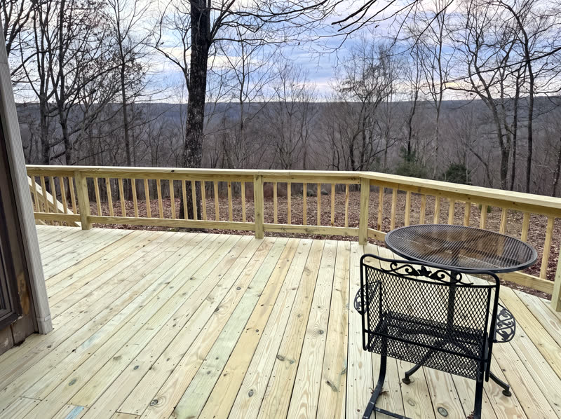 New wraparound wood deck and railing overlooking Cumberland Plateau ridgelines